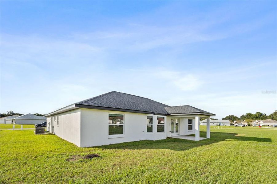Exterior details and patio area of a home in , Bushnell (Image 24).