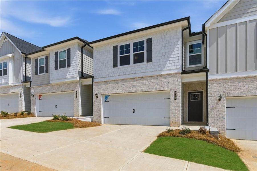 Front exterior of a new home in Diamante, Stockbridge, GA, highlighting curb appeal (Image 17).