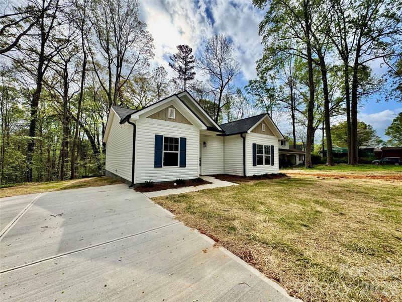 Front exterior of a new home in , Granite Quarry, NC, highlighting curb appeal (Image 16).