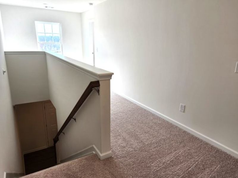 Representative unfurnished interior of a home built from the Boxwood Townhome by Piedmont Residential in The Retreat at Browns Ridge, Newnan (Image 49).