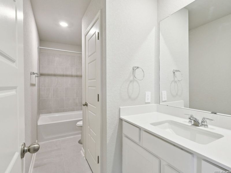 Furnished interior view inside a new home in Comanche Ridge, San Antonio (Image 6). Furnished interior view inside a new home in Comanche Ridge, San Antonio (Image 6).