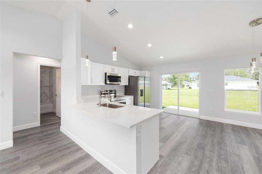 Furnished interior view inside a new home in , Dunnellon (Image 8).