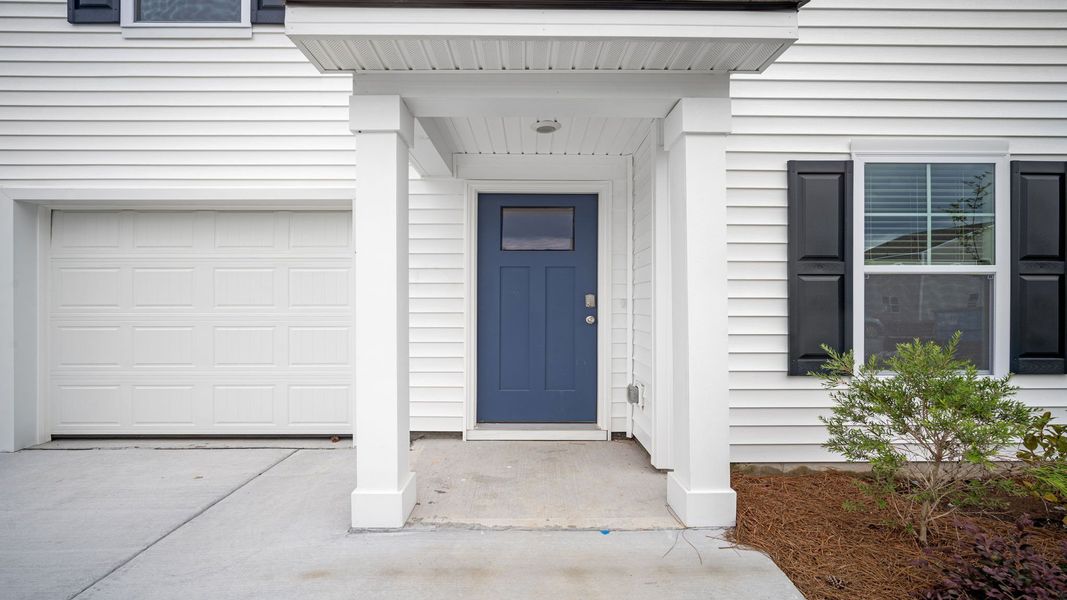 Front exterior of a new home in Longleaf Village, Rincon, GA, highlighting curb appeal (Image 2).