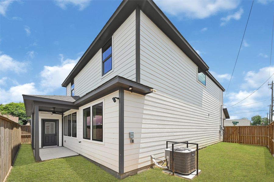 Exterior details and patio area of a home in , Houston (Image 19). Exterior details and patio area of a home in , Houston (Image 19).