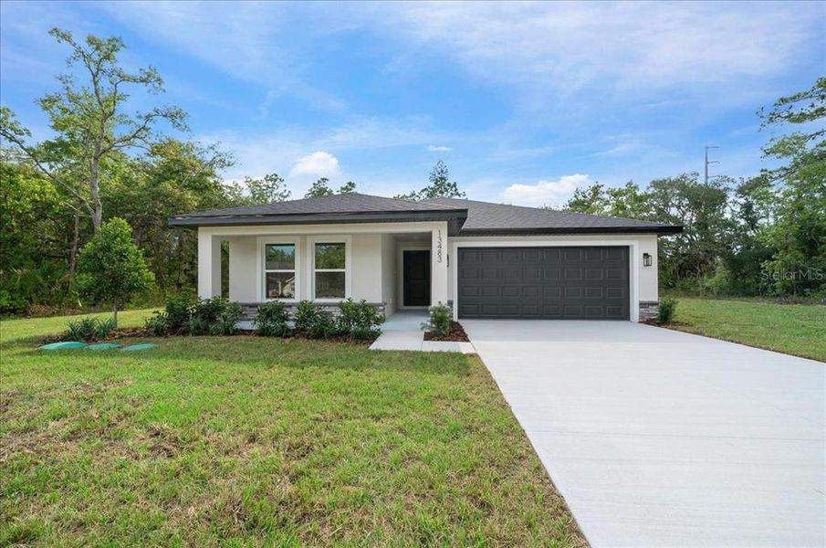 Front exterior of a new home in , Brooksville, FL, highlighting curb appeal (Image 29). Front exterior of a new home in , Brooksville, FL, highlighting curb appeal (Image 29).