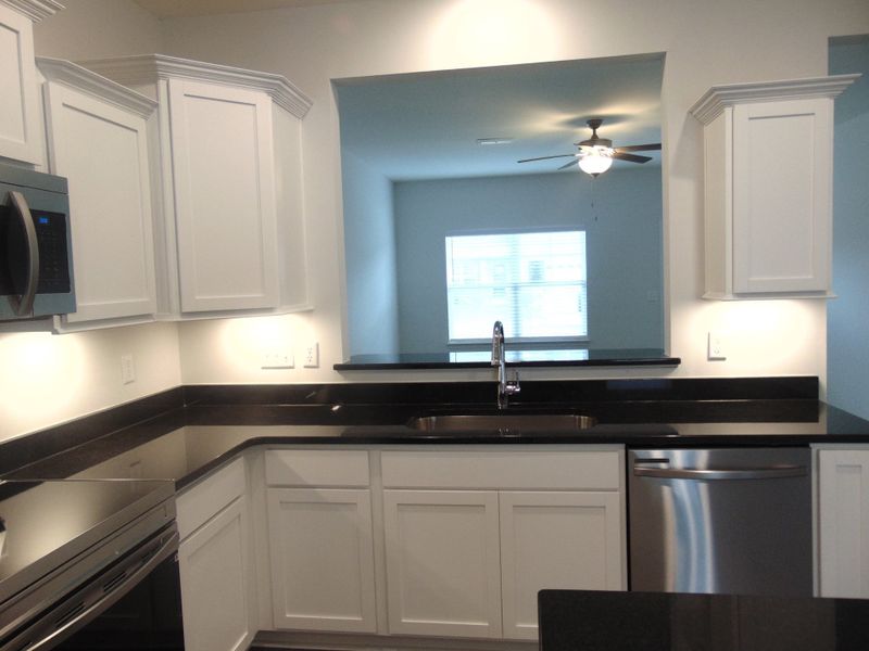 he kitchen is spacious and modern, it comes with steel appliances, and crown cabinetry for a unique look he kitchen is spacious and modern, it comes with steel appliances, and crown cabinetry for a unique look