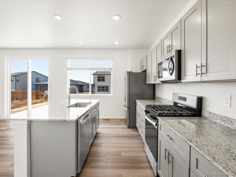 Furnished interior view inside a new home in Ridgeline Vista: The Flora Collection, Brighton (Image 9).