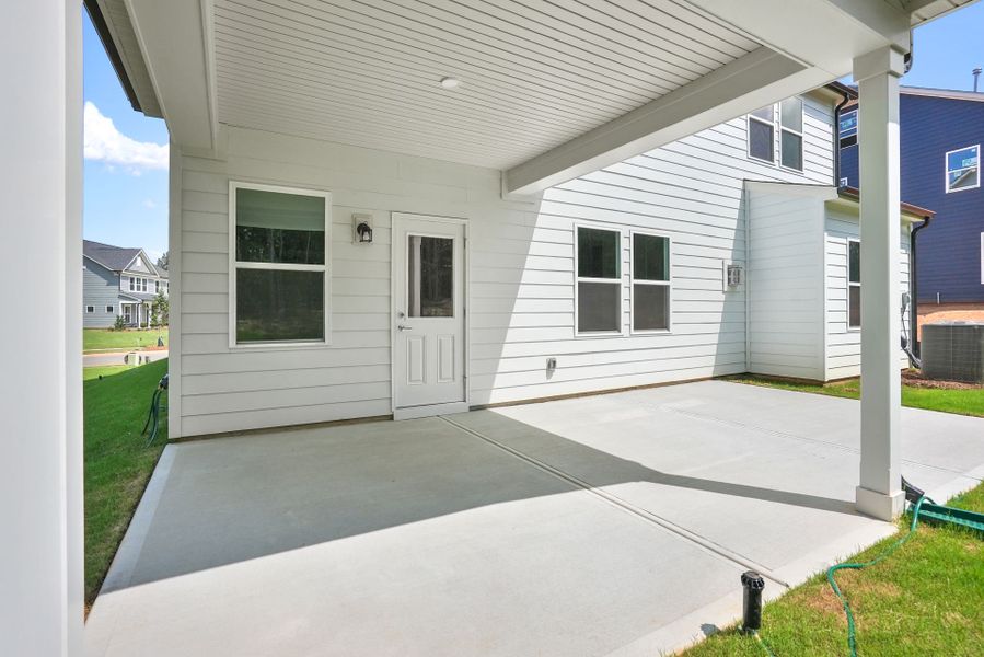 Exterior details and patio area of a home in Michaux Gardens, Belmont (Image 35).