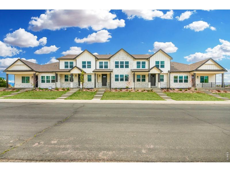 Front exterior of a new home in , Windsor, CO, highlighting curb appeal (Image 2). Front exterior of a new home in , Windsor, CO, highlighting curb appeal (Image 2).