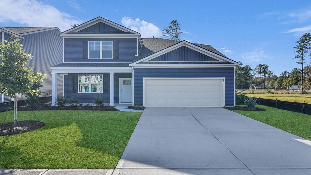 Front exterior of a new home in Pine Hills at Cane Bay, Summerville, SC, highlighting curb appeal (Image 1). Front exterior of a new home in Pine Hills at Cane Bay, Summerville, SC, highlighting curb appeal (Image 1).