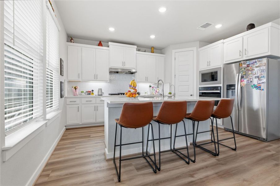 Furnished interior view inside a new home in University Heights, Round Rock (Image 10).
