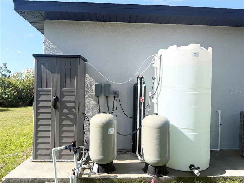 Exterior details and patio area of a home in , North Port (Image 24).