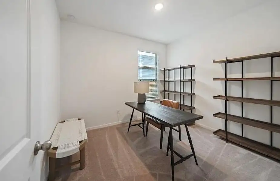 Furnished interior view inside a new home in The Pines At Seven Coves, Conroe (Image 6).