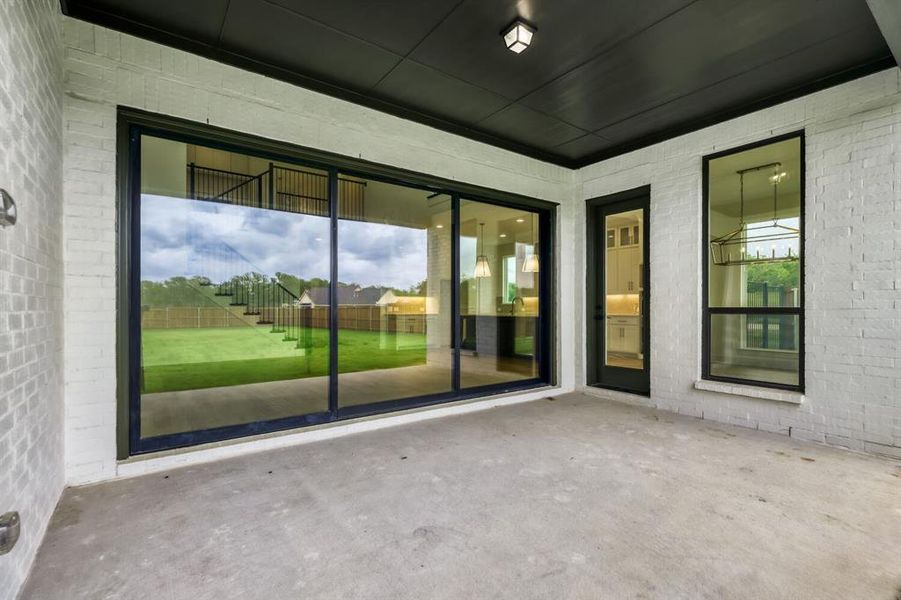 Exterior details and patio area of a home in Lakewood Village, Lakewood Village (Image 3).