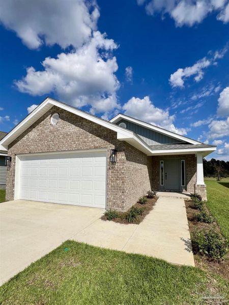 Front exterior of a new home in Allison Acres, Cantonment, FL, highlighting curb appeal (Image 2). Front exterior of a new home in Allison Acres, Cantonment, FL, highlighting curb appeal (Image 2).