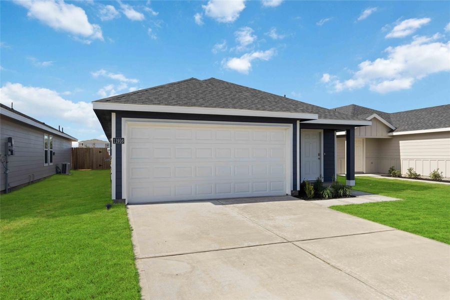 Front exterior of a new home in Legacy Village, Houston, TX, highlighting curb appeal (Image 19).