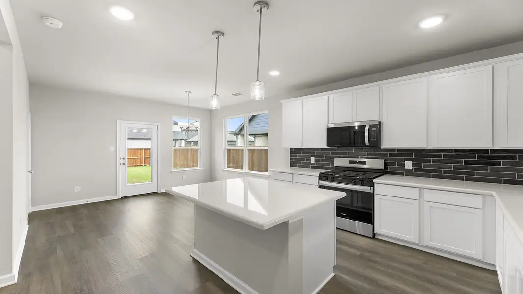 Furnished interior view inside a new home in Waterscape, Royse City (Image 7).