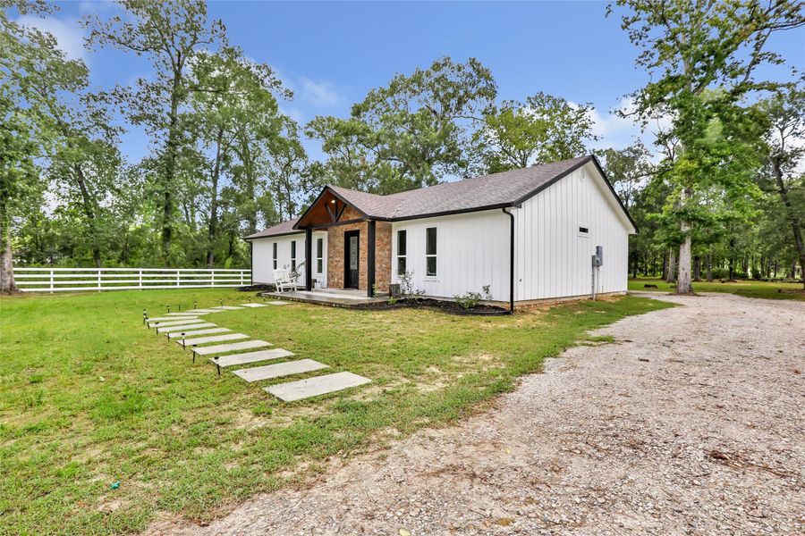 Front exterior of a new home in , Dayton, TX, highlighting curb appeal (Image 17). Front exterior of a new home in , Dayton, TX, highlighting curb appeal (Image 17).
