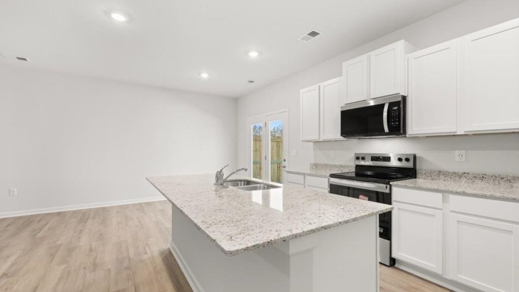 Furnished interior view inside a new home in Hughes Court, Dawsonville (Image 3).