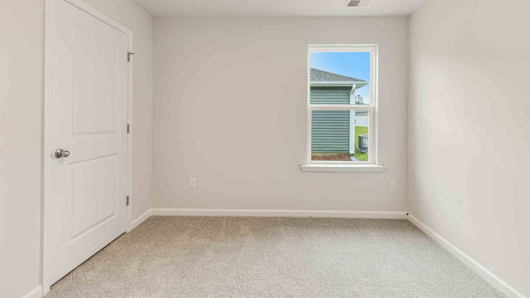 Spacious, unfurnished interior of a new home in Cedar Hill Landing, Navassa (Image 23).