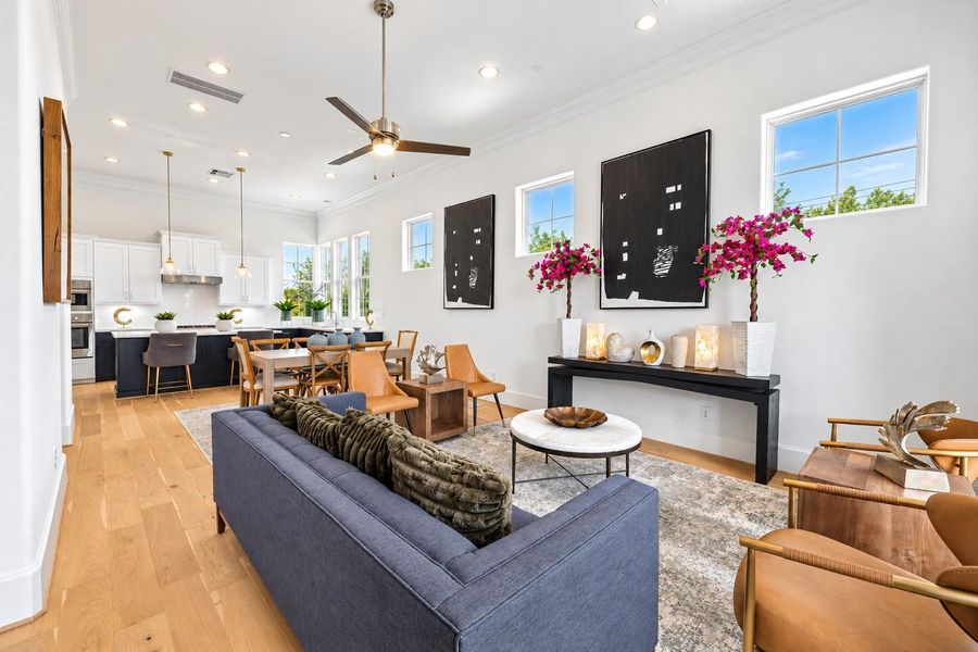 Soaring ceilings and so much natural light in this second-floor living and dining area.