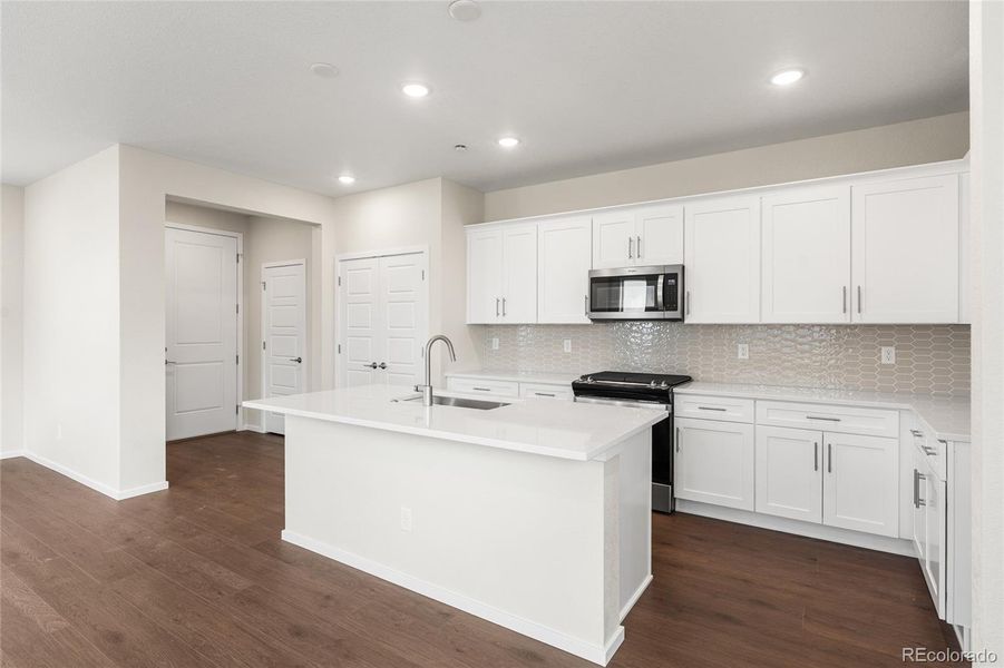 Furnished interior view inside a new home in Painted Prairie, Aurora (Image 11).