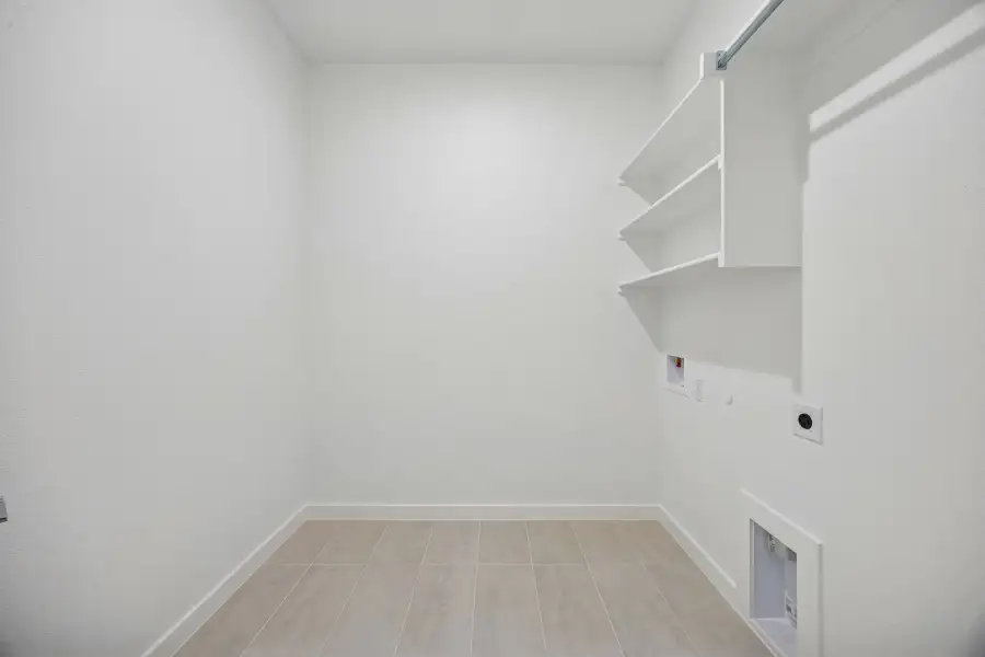 Utility Room in the Gilmour II home plan by Trophy Signature Homes – REPRESENTATIVE PHOTO