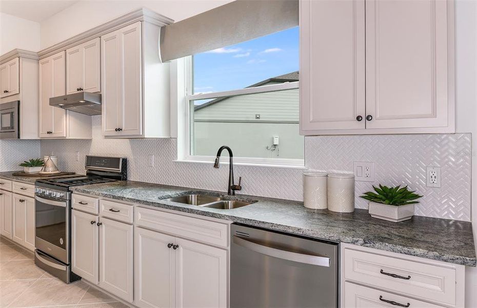 Furnished interior view inside a new home in Tohoqua Reserve, Kissimmee (Image 6).