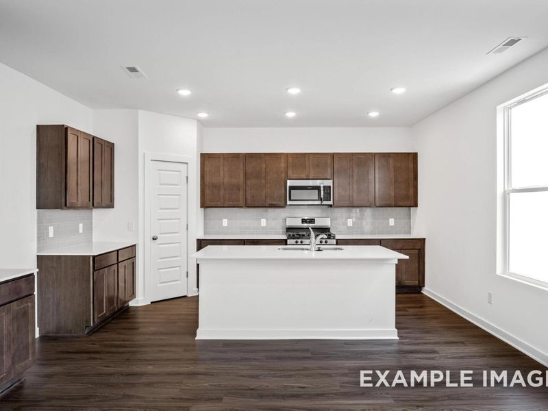 Representative furnished interior of a home built from the The Logan C by Davidson Homes LLC in Sage Farms, White House (Image 9).