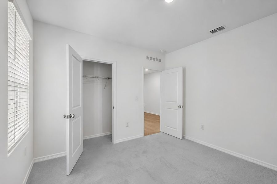 Representative unfurnished interior of a home built from the Goldfinch by Taylor Morrison in Westview Community Group Page, Kissimmee (Image 21).