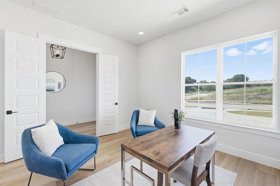 Office off of entry, double doors for privacy