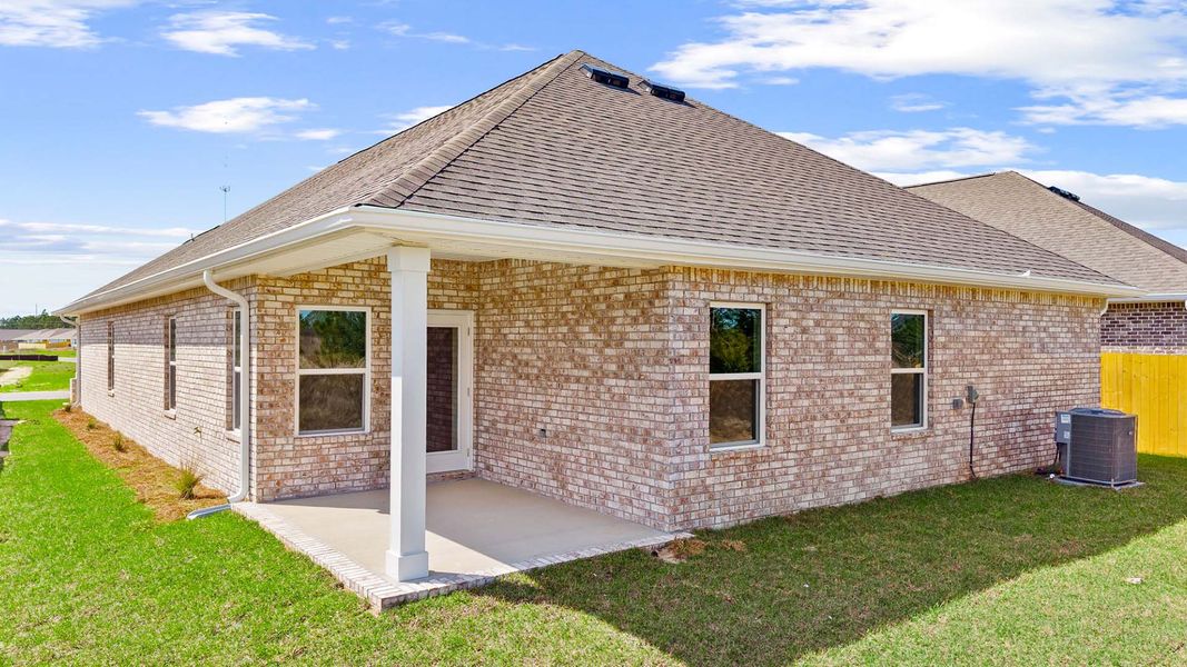 Exterior details and patio area of a home in Owl's Head Farms, Freeport (Image 4).