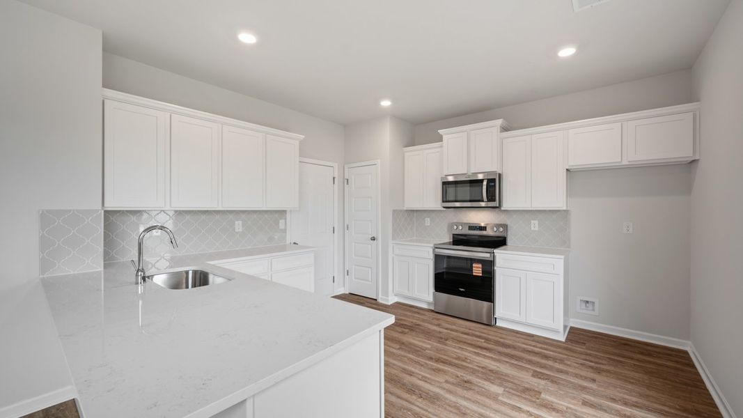 Furnished interior view inside a new home in Willowbrook, Winder (Image 5).