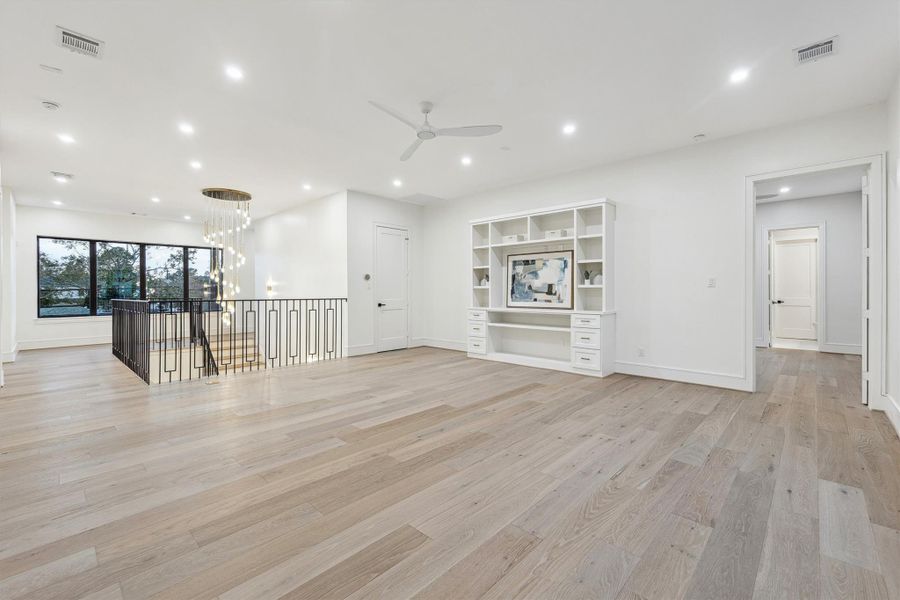 Gameroom on the second floor - offers cutom built-ins.