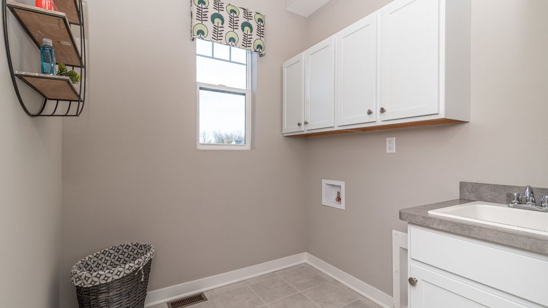 Representative furnished interior of a home built from the The Natural by Norfolk Homes in Coronado Estates, Jackson (Image 47).