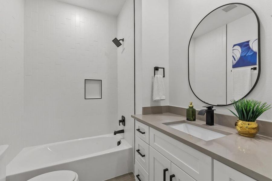 Full bathroom featuring shower / tub Full bathroom featuring shower / tub