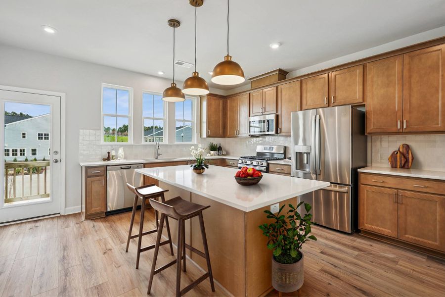 Representative furnished interior of a home built from the Nola by Tri Pointe Homes in Mews at Holding Village, Wake Forest (Image 6).