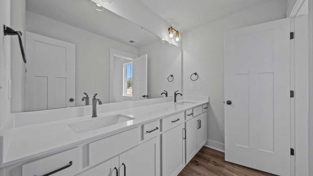 Stylish guest bathroom with superior design and thoughtful storage solutions