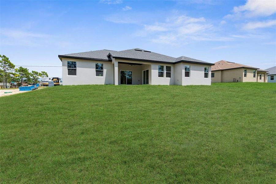 Exterior details and patio area of a home in , Weeki Wachee (Image 42).