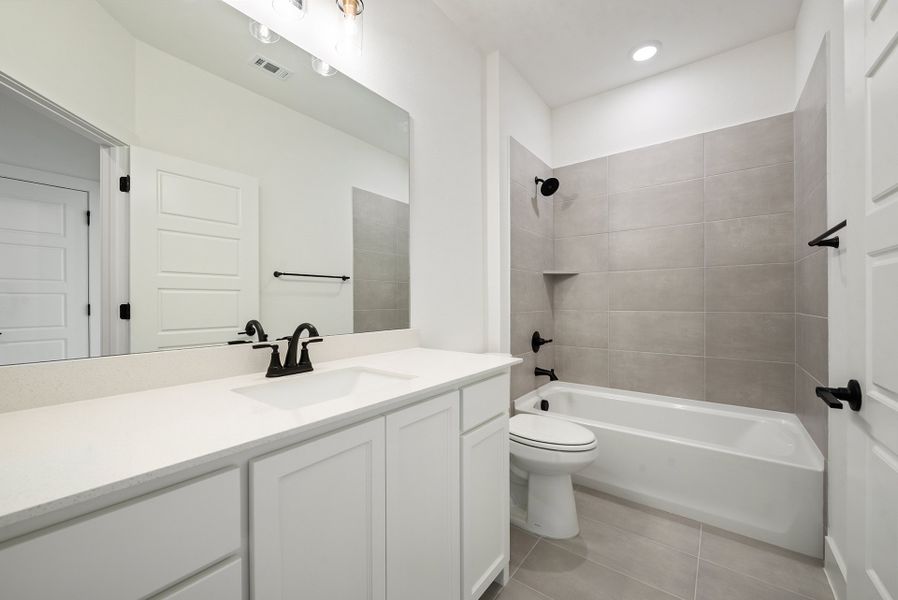Furnished interior view inside a new home in Tavolo Park, Fort Worth (Image 14).