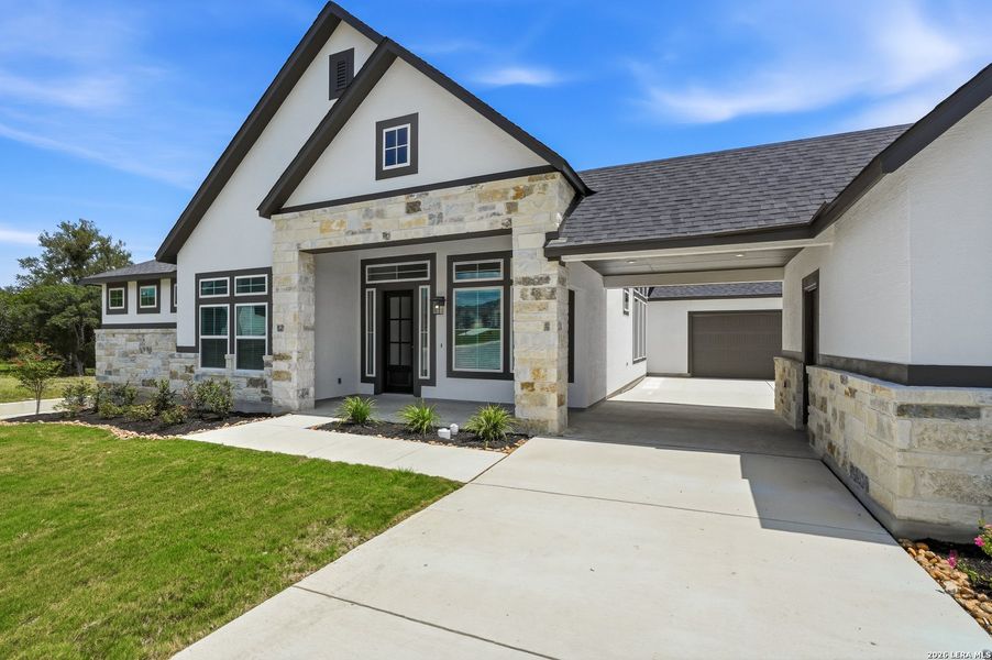 Front exterior of a new home in , Castroville, TX, highlighting curb appeal (Image 26).