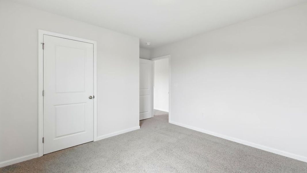 Spacious, unfurnished interior of a new home in Treemont Commons, Wellford (Image 32).