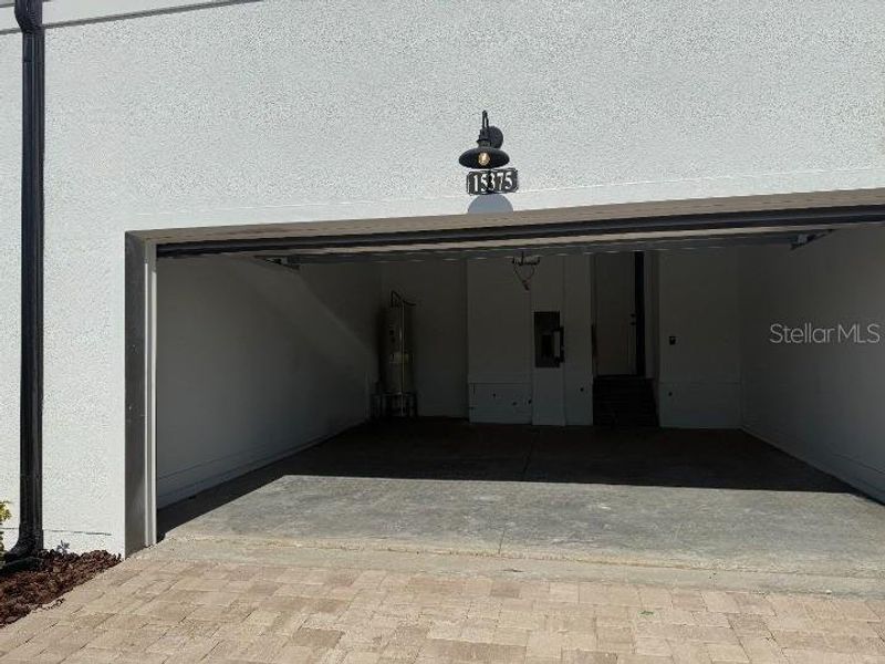 Exterior details and patio area of a home in Parkview at Hamlin, Winter Garden (Image 2).