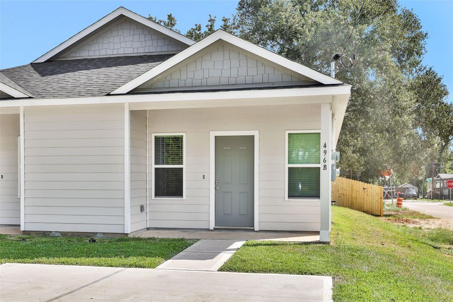 Front exterior of a new home in , Willis, TX, highlighting curb appeal (Image 20).
