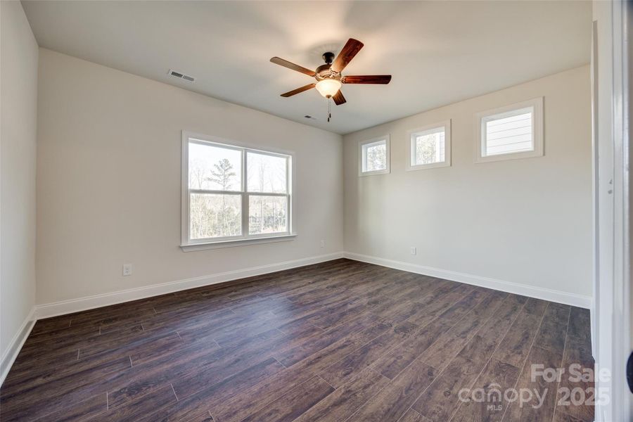 Primary bedroom-faces backyard with tons of natural light