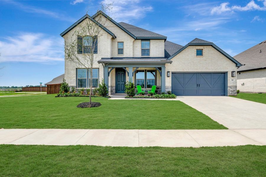 Front exterior of a new home in Myrtle Creek, Waxahachie, TX, highlighting curb appeal (Image 1). Front exterior of a new home in Myrtle Creek, Waxahachie, TX, highlighting curb appeal (Image 1).