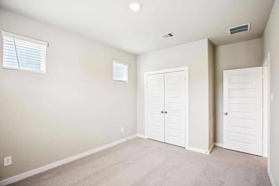 Spacious, unfurnished interior of a new home in Kemah Crossing - City Series, Kemah (Image 34). Spacious, unfurnished interior of a new home in Kemah Crossing - City Series, Kemah (Image 34).