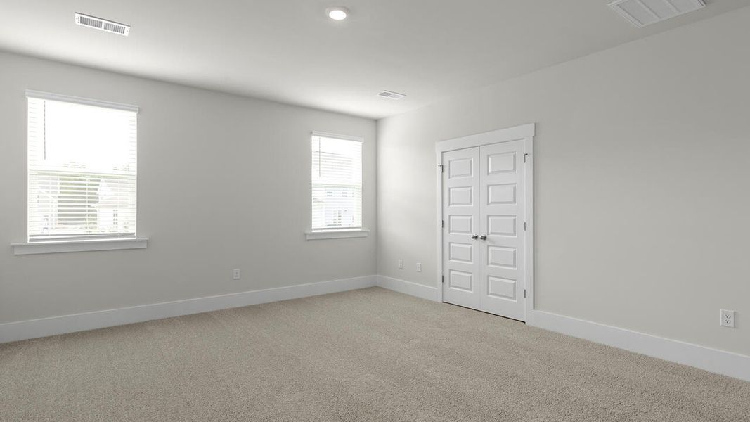 Spacious, unfurnished interior of a new home in Surfside Landing, Hubert (Image 24).