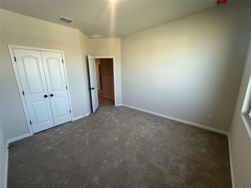 Spacious, unfurnished interior of a new home in The Cottages at Lariat, Liberty Hill (Image 16).