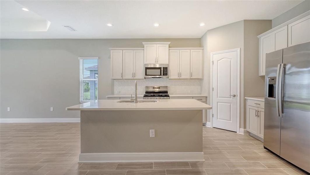 Furnished interior view inside a new home in Wildleaf, Parrish (Image 11).